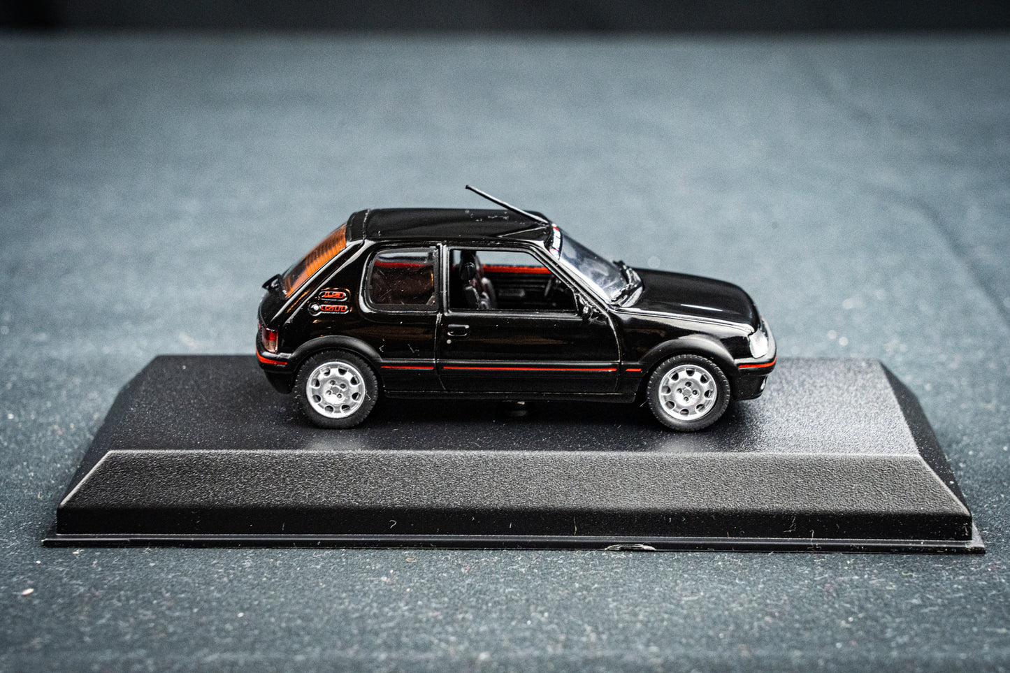 Peugeot 205 GTI 1.9 BJ 1992 black with PTS Deko Norev 1:43