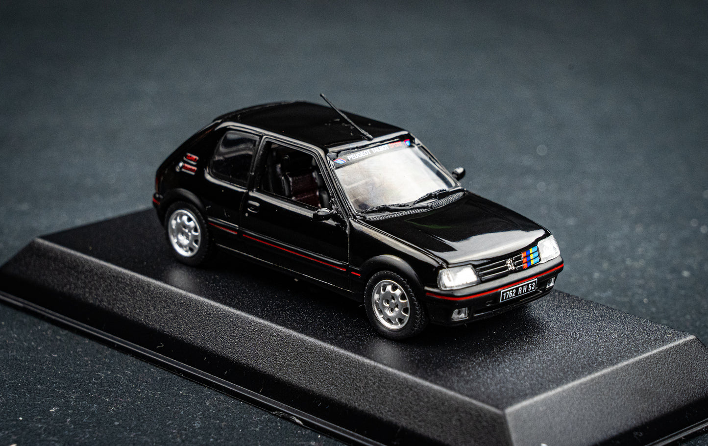 Peugeot 205 GTI 1.9 BJ 1992 black with PTS Deko Norev 1:43