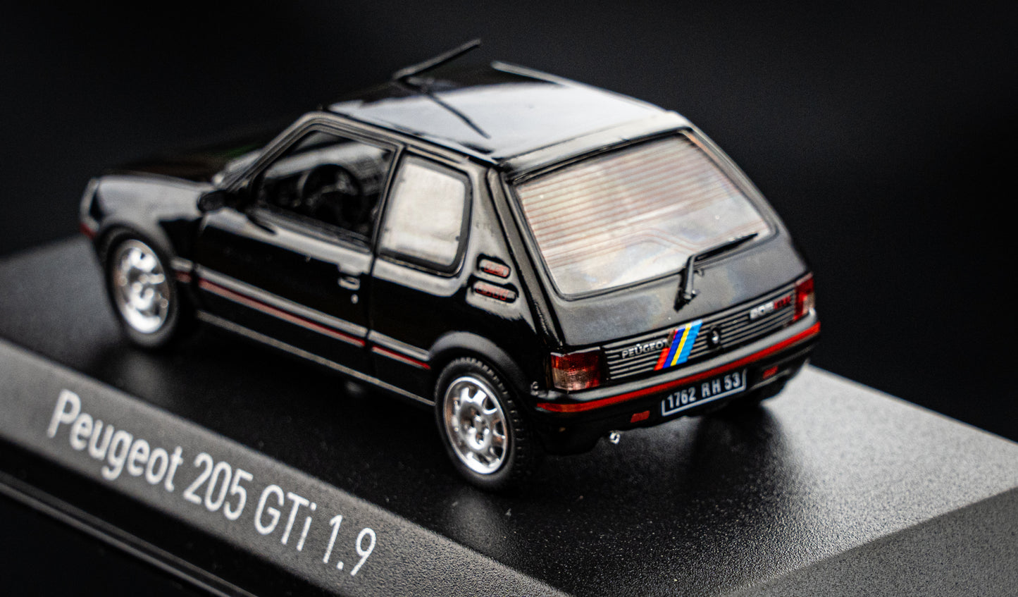 Peugeot 205 GTI 1.9 BJ 1992 black with PTS Deko Norev 1:43