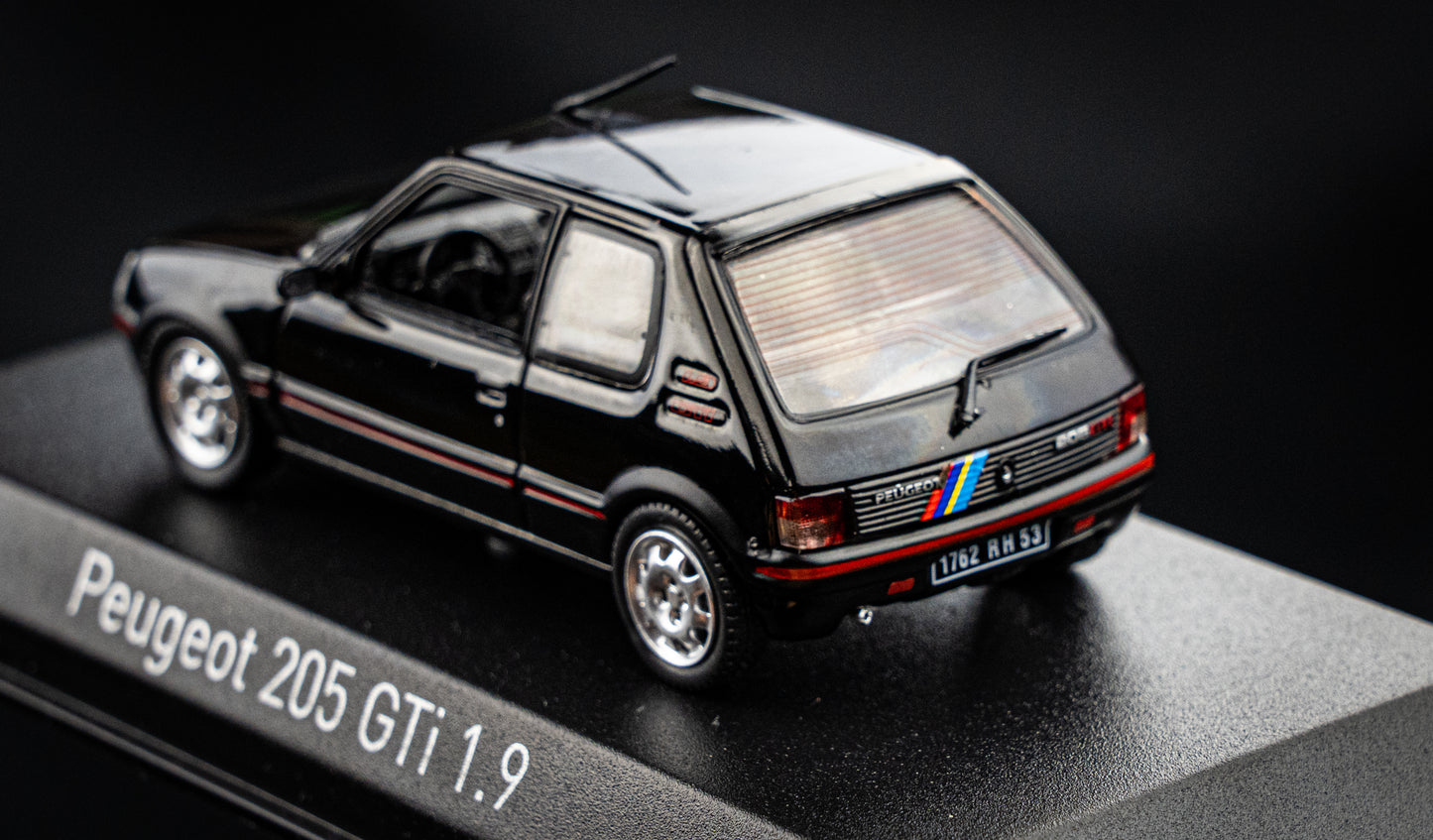 Peugeot 205 GTI 1.9 BJ 1992 black with PTS Deko Norev 1:43