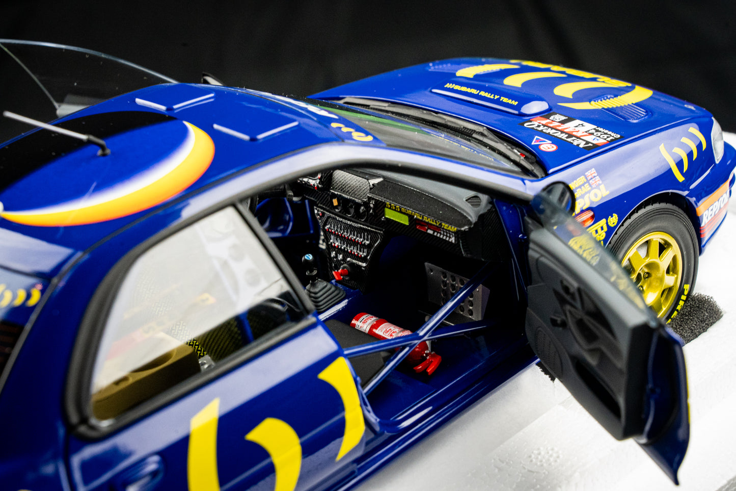 Subaru Impreza Gr. A #4 C. McRae / D. Ringer L-555 BAT - RAC Rallye 1994 - Kyosho 1:18