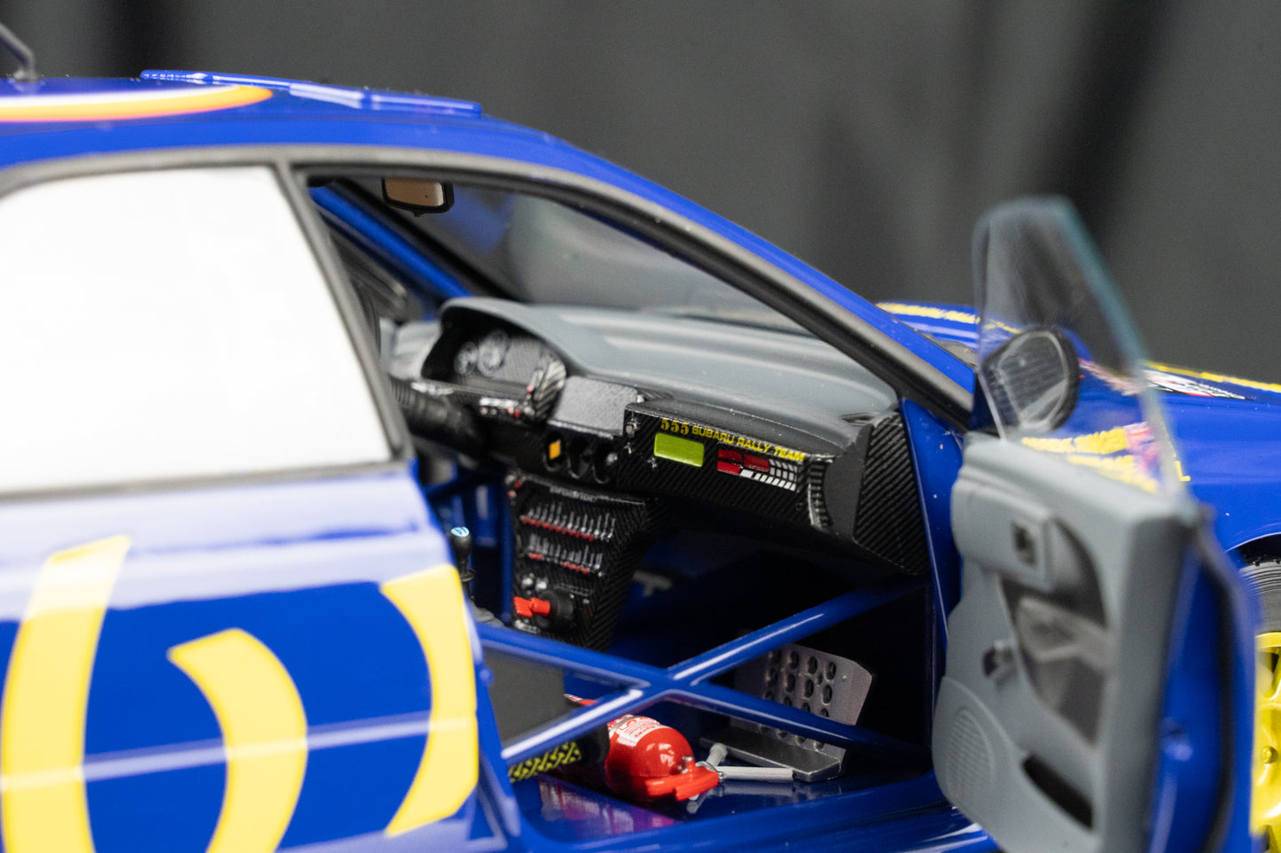 Subaru Impreza Gr. A  #4 C. McRae / D. Ringer L-555 BAT - RAC Rallye 1996 - Kyosho 1:18