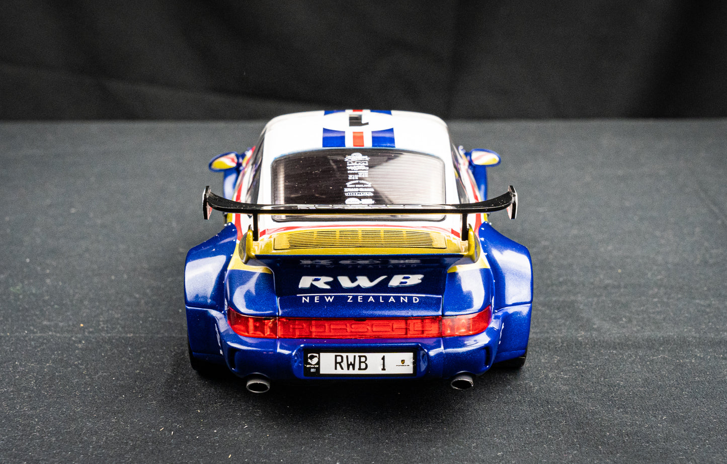 Porsche 911 (964) RWB Rauh - Welt 2022 blue / white / red / gold - Solido 1:18