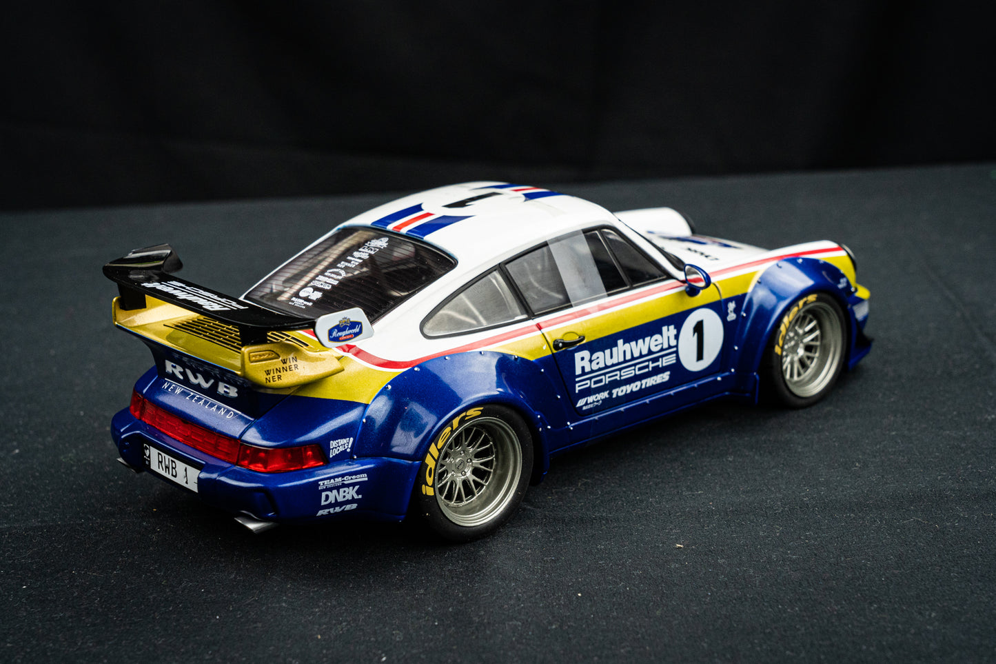 Porsche 911 (964) RWB Rauh - Welt 2022 blue / white / red / gold - Solido 1:18