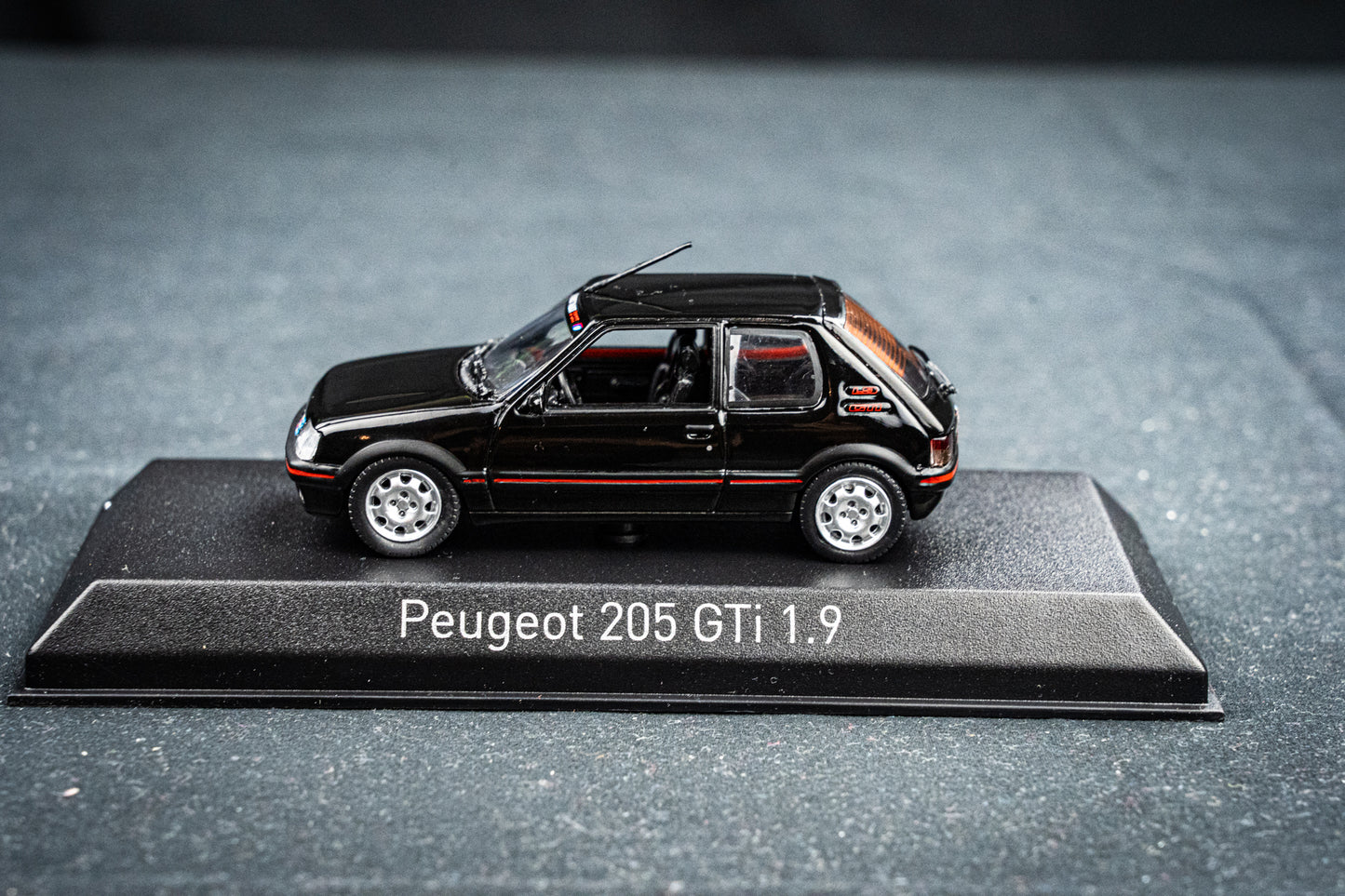 Peugeot 205 GTI 1.9 BJ 1992 black with PTS Deko  Norev 1:43