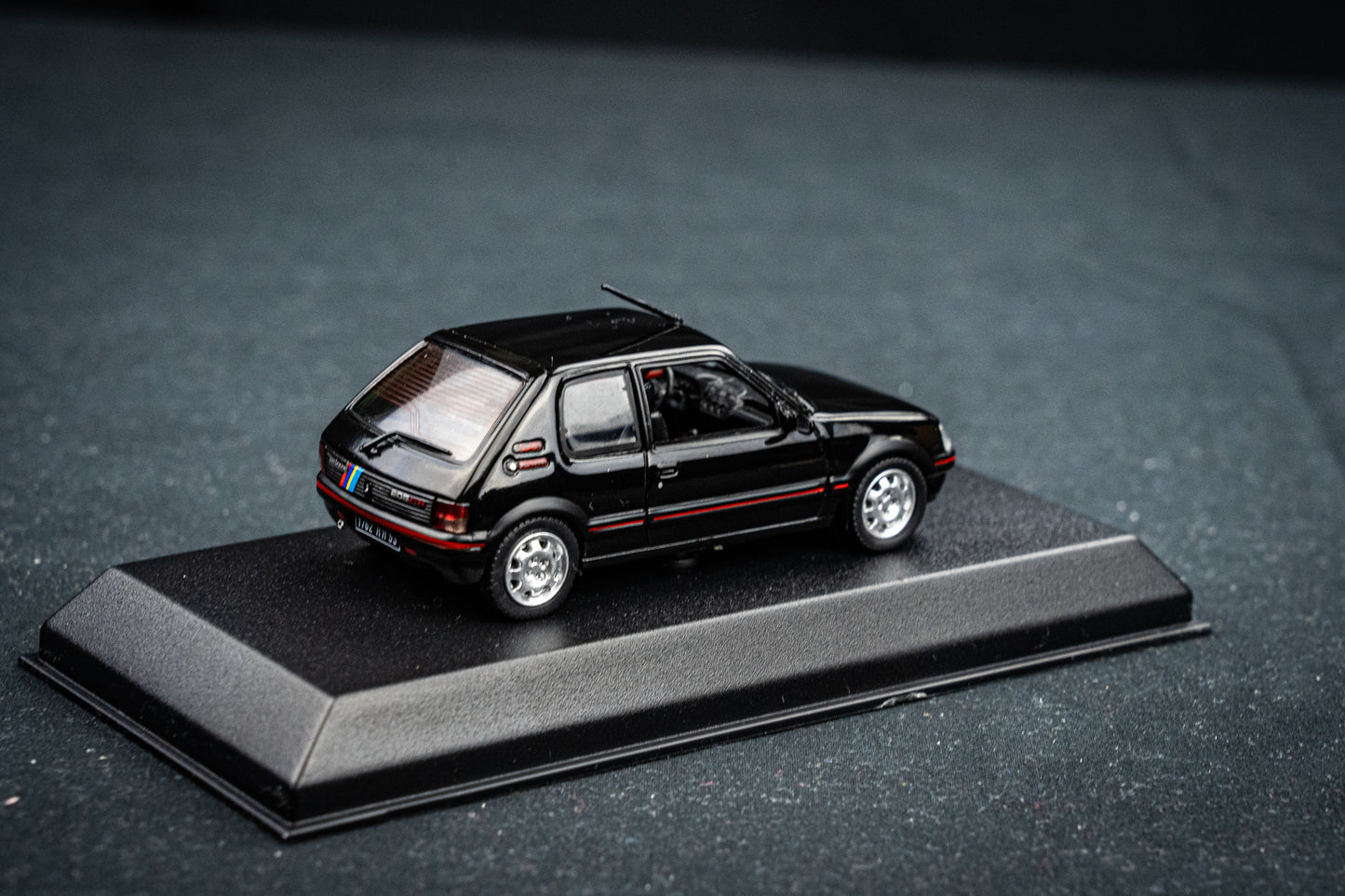 Peugeot 205 GTI 1.9 BJ 1992 black with PTS Deko  Norev 1:43