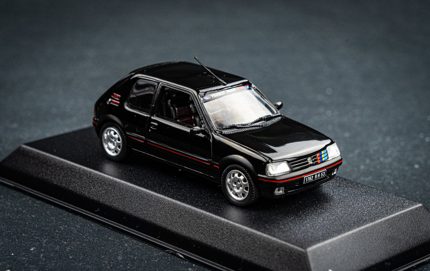 Peugeot 205 GTI 1.9 BJ 1992 black with PTS Deko  Norev 1:43