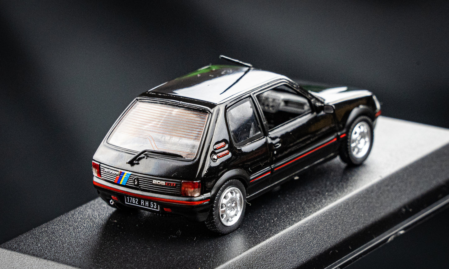 Peugeot 205 GTI 1.9 BJ 1992 black with PTS Deko  Norev 1:43