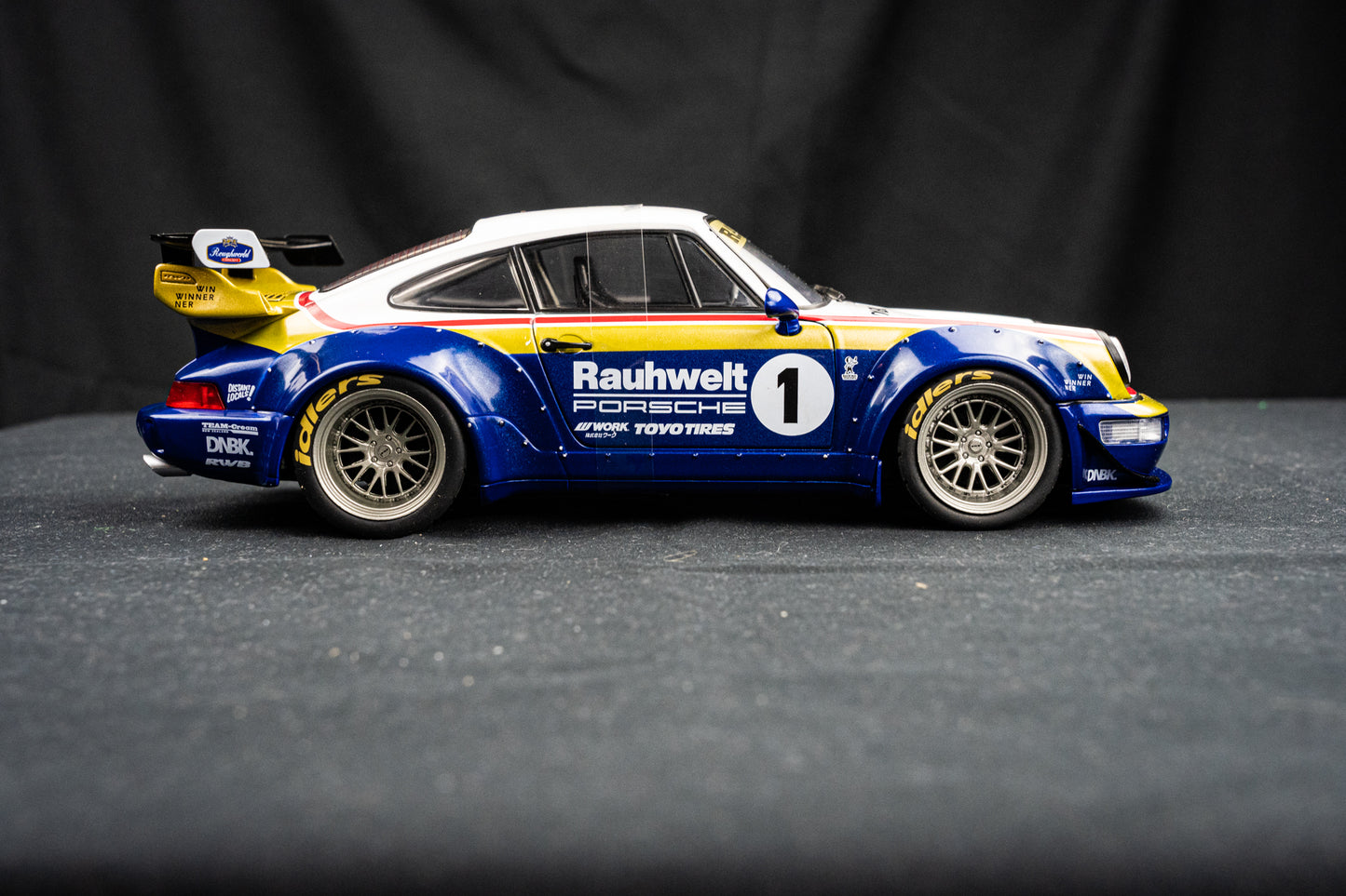 Porsche 911 (964) RWB Rauh - Welt 2022 blue / white / red / gold - Solido 1:18