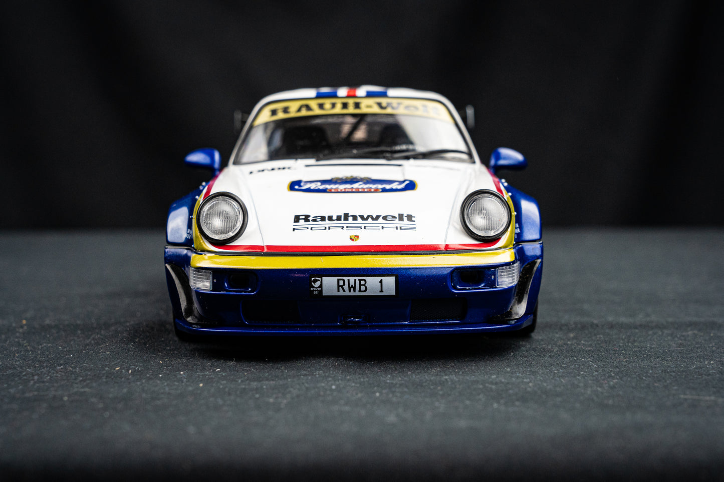 Porsche 911 (964) RWB Rauh - Welt 2022 blue / white / red / gold - Solido 1:18